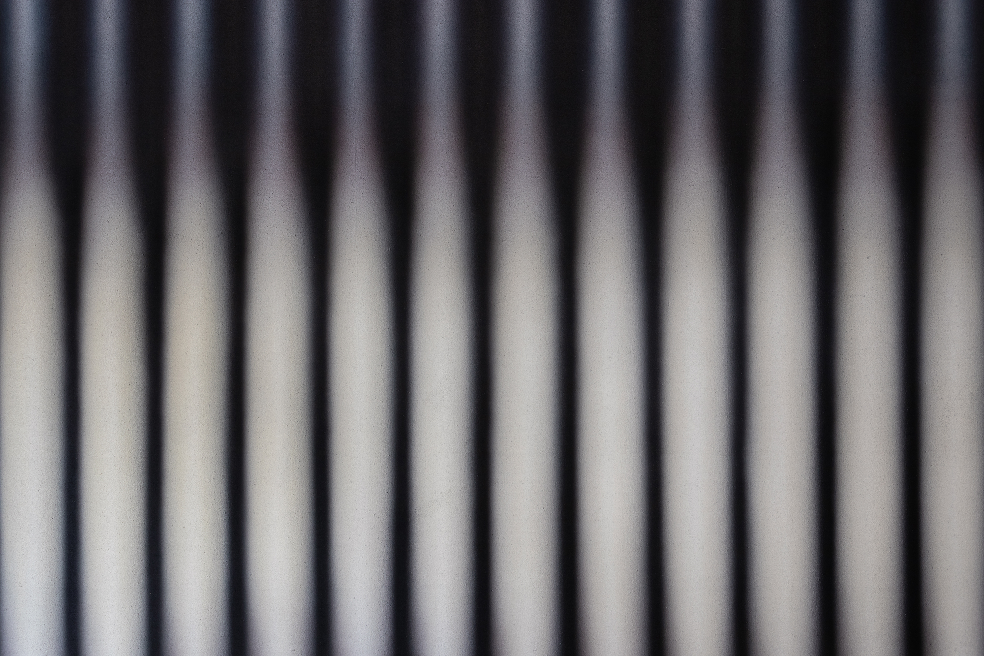 Vertical bands in black, white and purple.